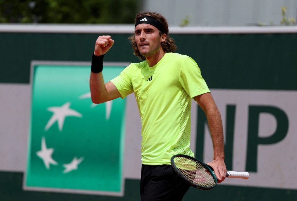 Stefanos Tsitsipas reacts after his surprising loss to Matteo Gigante at the 2025 French Open.