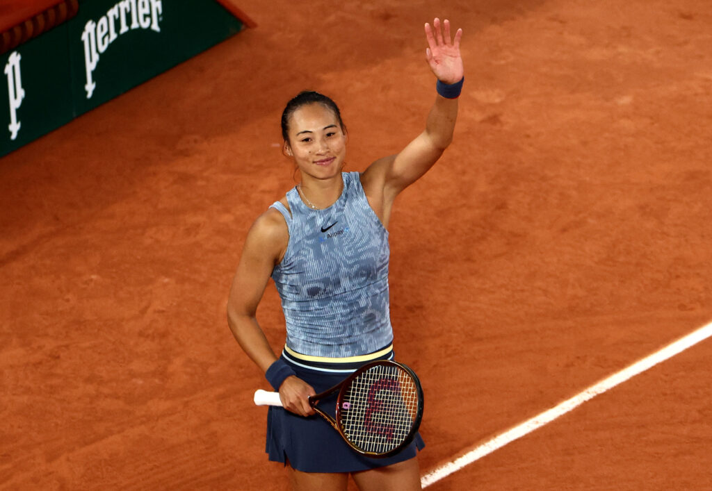 Qinwen Zheng celebrates her victory, advancing to her first French Open quarter-final after a thrilling match against Samsonova.