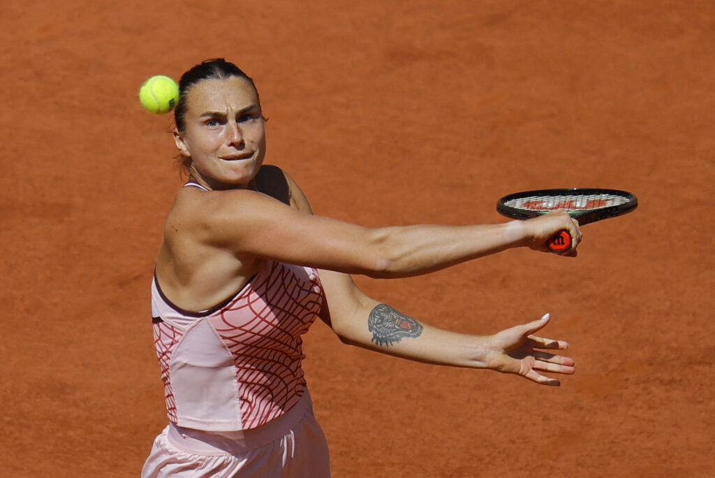 Aryna Sabalenka celebrates her victory over Anisimova at the French Open, showcasing her dominance on clay.